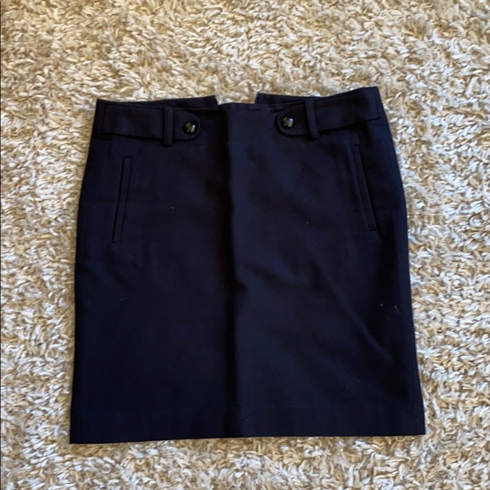 Fashionable black skirt with faux belt and pockets